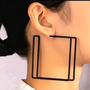 Exaggerated large geometric earrings
